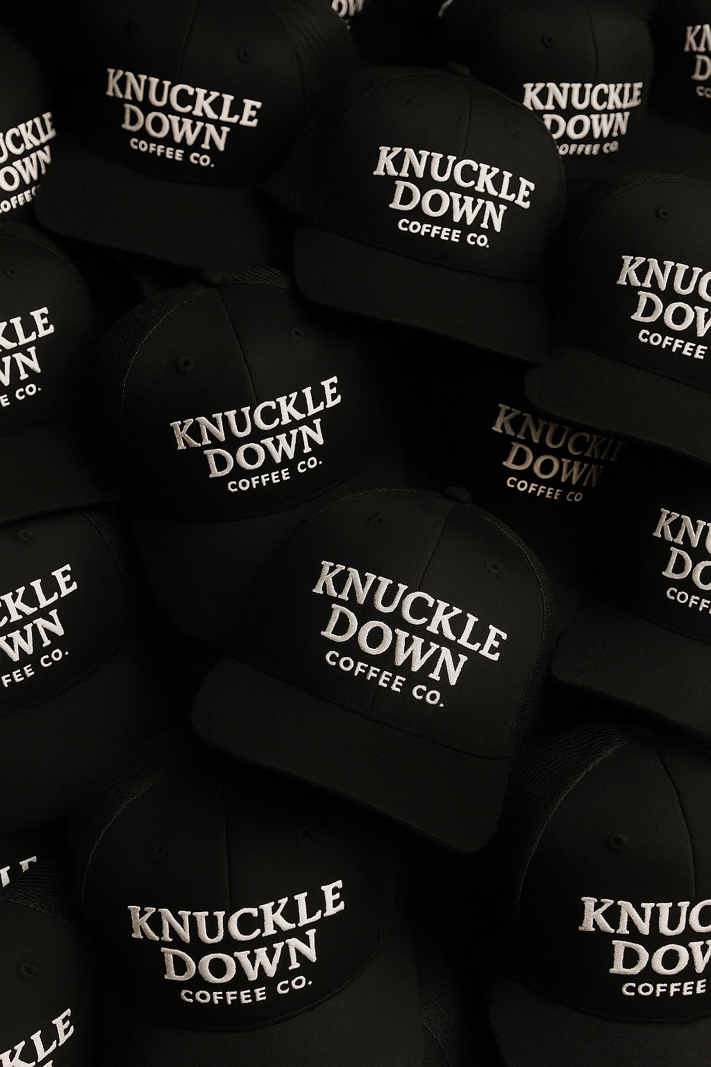 Black Knuckle Down Coffee hats with white embroidered logos